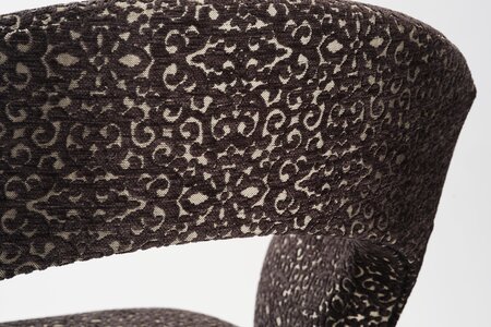 Polsterstuhl mit Rückholsystem